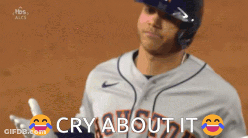 A Baseball Player Says " Cry About It " While Holding His Bat GIF