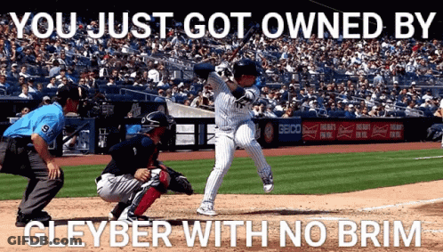 A Baseball Player Swings At A Pitch With The Caption " You Just Got Owned By Gleyber With No Brim " GIF