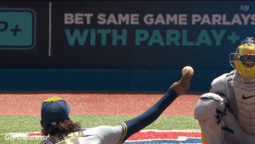 A Baseball Player Throws A Ball In Front Of A Sign That Says " Bet Same Game Parlays With Parlay + " GIF