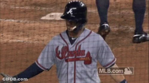 A Baseball Player Wearing A Atlanta Braves Jersey GIF