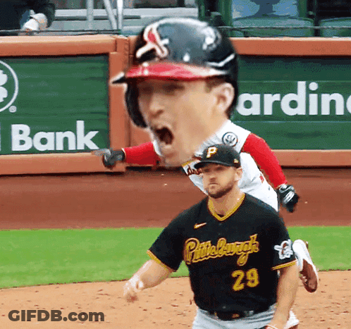 A Baseball Player Wearing A Black Jersey With The Number 29 GIF