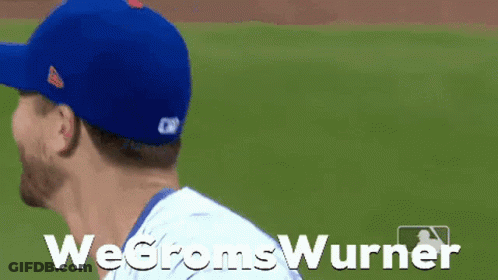 A Baseball Player Wearing A Blue Hat Is Smiling With The Words Wegromswurner Written Below Him GIF