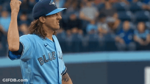 A Baseball Player Wearing A Blue Jays Jersey GIF