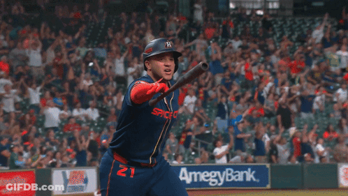 A Baseball Player Wearing A Blue Jersey That Says Space GIF