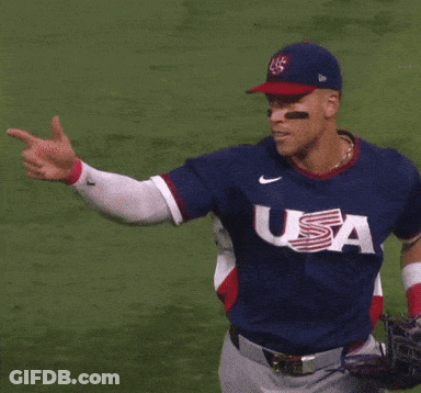 A Baseball Player Wearing A Blue Jersey That Says Usa On It GIF