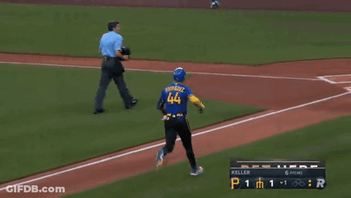 A Baseball Player Wearing A Blue Jersey With The Number 44 On It GIF