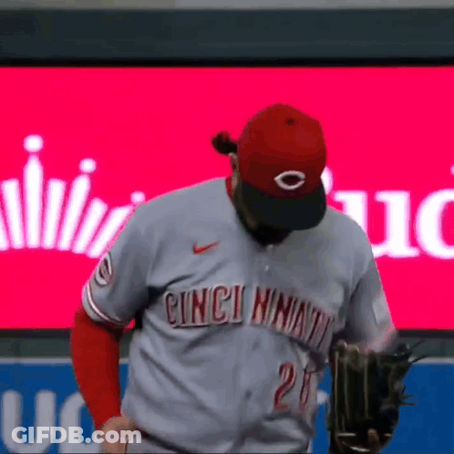 A Baseball Player Wearing A Cincinnati Jersey With The Number 26 On It GIF