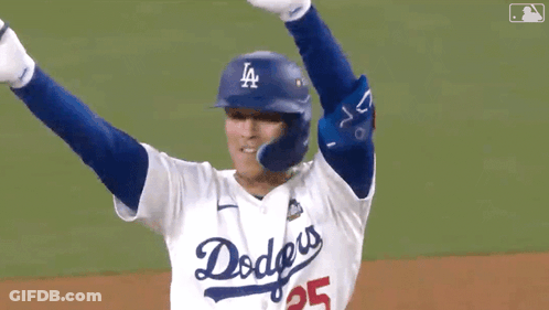 A Baseball Player Wearing A Dodgers Jersey Celebrates GIF