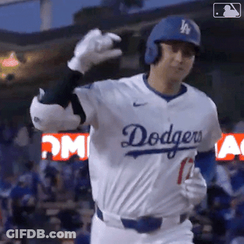 A Baseball Player Wearing A Dodgers Jersey Is Giving A Thumbs Up GIF