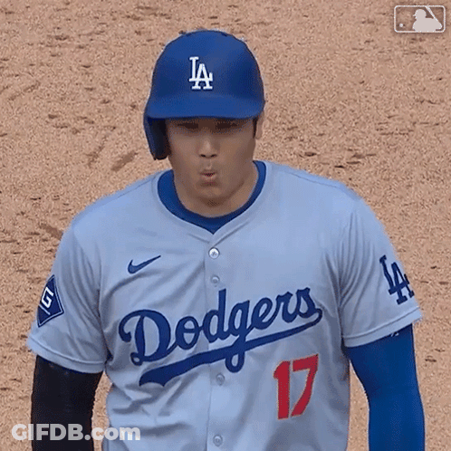 A Baseball Player Wearing A Dodgers Jersey Is Making A Face GIF