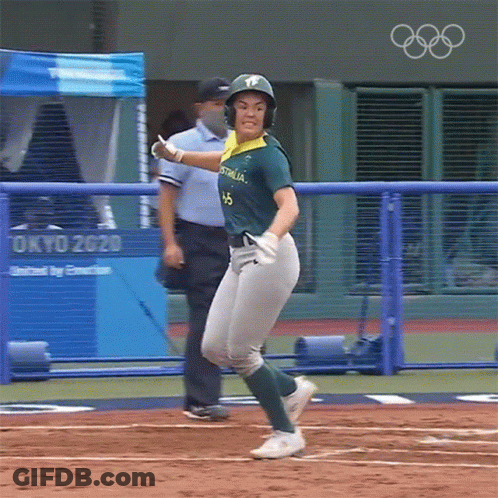 A Baseball Player Wearing A Green And Yellow Jersey With Australia On It GIF