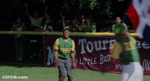 A Baseball Player Wearing A Green And Yellow Jersey With The Word Warner On It GIF