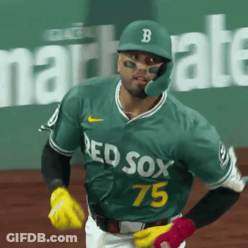 A Baseball Player Wearing A Green Jersey That Says Red Sox 75 On It GIF