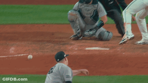A Baseball Player Wearing A Green Jersey That Says Reds On It GIF
