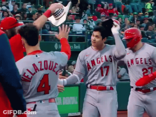 A Baseball Player Wearing A Grey Jersey With The Number 4 On It GIF