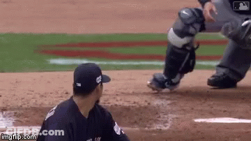 A Baseball Player Wearing A Hat That Says ' MLB ' On The Back GIF