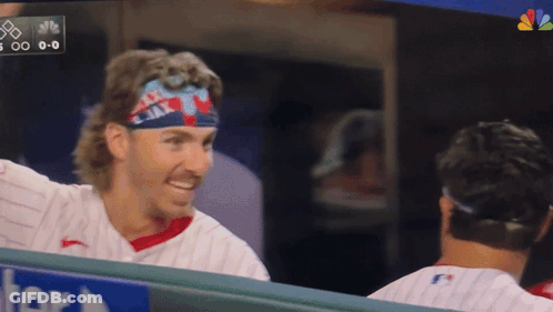 A Baseball Player Wearing A Headband That Says Ejax GIF