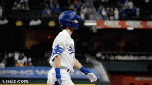 A Baseball Player Wearing A Helmet And A Dodgers Uniform GIF