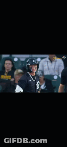 A Baseball Player Wearing A Helmet And A Jersey With The Letter D On It GIF