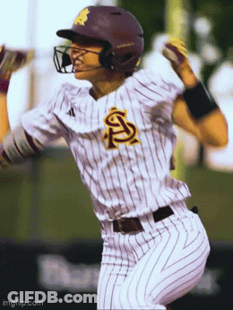 A Baseball Player Wearing A Helmet And A Jersey With The Letter S On It GIF