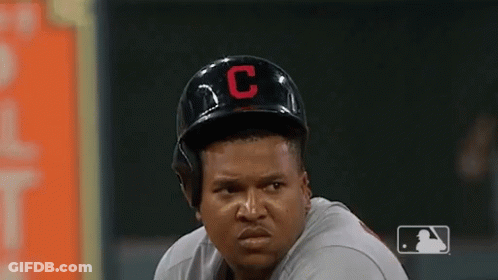 A Baseball Player Wearing A Helmet With A C On It GIF