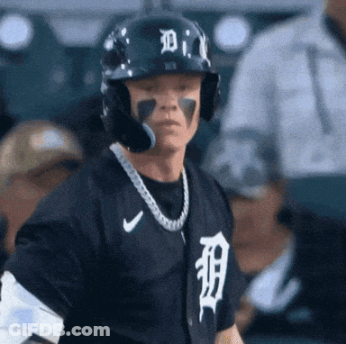 A Baseball Player Wearing A Helmet With The Letter D. On It GIF