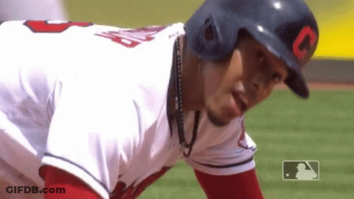 A Baseball Player Wearing A Helmet With The Letter O On The Front GIF
