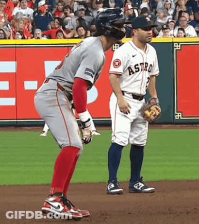 A Baseball Player Wearing A Jersey That Says Astro GIF