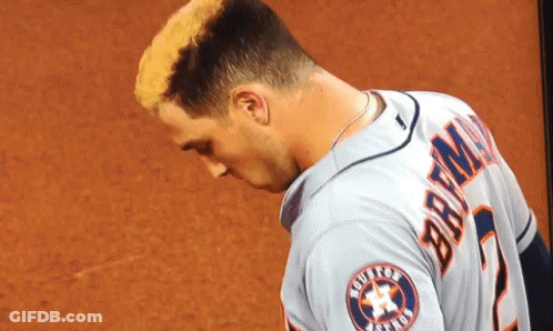 A Baseball Player Wearing A Jersey That Says Braun On It GIF