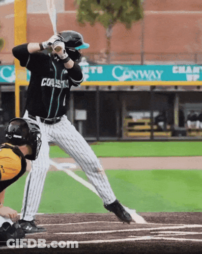 A Baseball Player Wearing A Jersey That Says Coast GIF