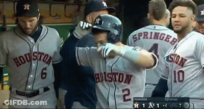 A Baseball Player Wearing A Jersey That Says Houston 2 GIF