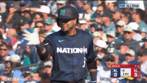 A Baseball Player Wearing A Jersey That Says Nation GIF