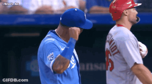 A Baseball Player Wearing A Jersey That Says Not Is Standing Next To Another Player GIF