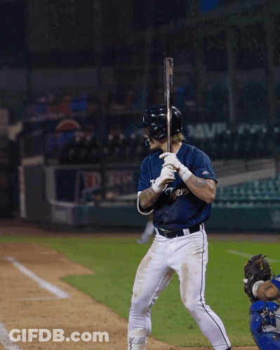 A Baseball Player Wearing A Jersey That Says ' Rays ' On It Is Getting Ready To Bat GIF