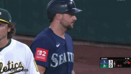 A Baseball Player Wearing A Jersey That Says Seattle On It GIF