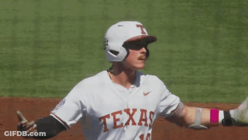 A Baseball Player Wearing A Jersey That Says " Texas " On It GIF