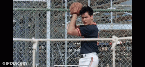 A Baseball Player Wearing A Jersey With The Letter C On It Is Throwing A Ball GIF
