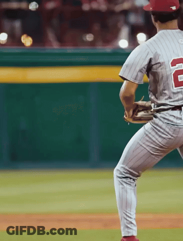 A Baseball Player Wearing A Jersey With The Number 2 On It GIF