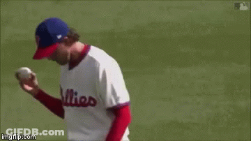 A Baseball Player Wearing A Jersey With The Number 22 On It GIF