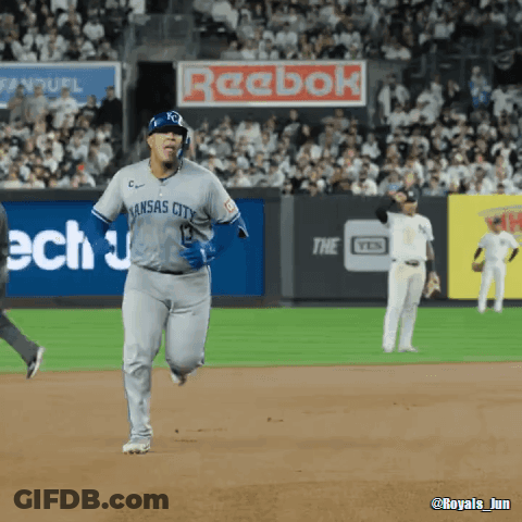 A Baseball Player Wearing A Kansas City Jersey Runs On The Field GIF