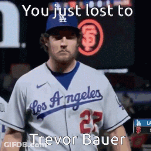A Baseball Player Wearing A Los Angeles Jersey And Hat GIF