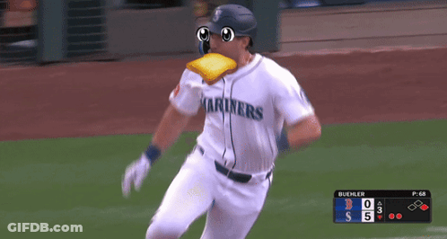 A Baseball Player Wearing A Mariners Jersey Is Running GIF