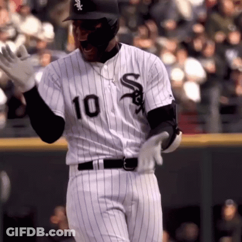 A Baseball Player Wearing A Number 10 Jersey GIF