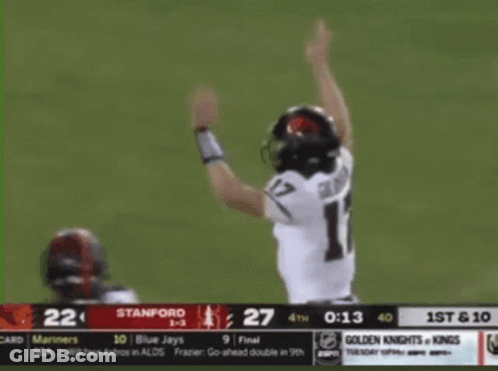 A Baseball Player Wearing A Number 17 Jersey Stands On The Field GIF