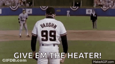 A Baseball Player Wearing A Number 99 Jersey Is Standing On A Field . GIF