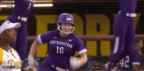 A Baseball Player Wearing A Purple Uniform With The Number 16 On It Is Running Towards The Base . GIF