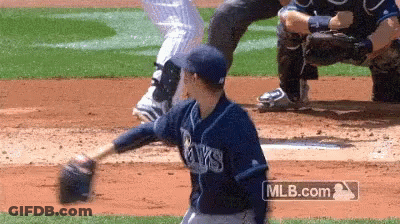 A Baseball Player Wearing A Rays Jersey Is About To Throw The Ball GIF