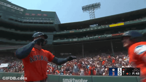 A Baseball Player Wearing A Red Astros Jersey GIF