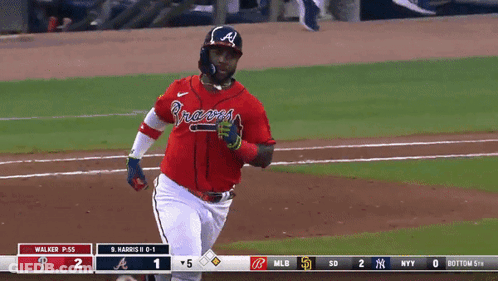 A Baseball Player Wearing A Red Braves Jersey GIF