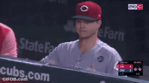 A Baseball Player Wearing A Red Cubs Hat GIF